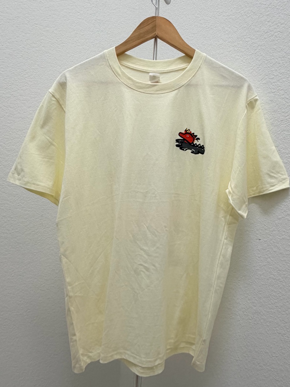 Cream Short-Sleeve Tee with Small Red Graphic